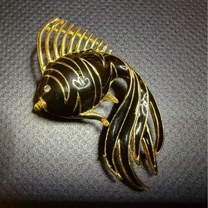 Elegant Black and Gold Fish Brooch